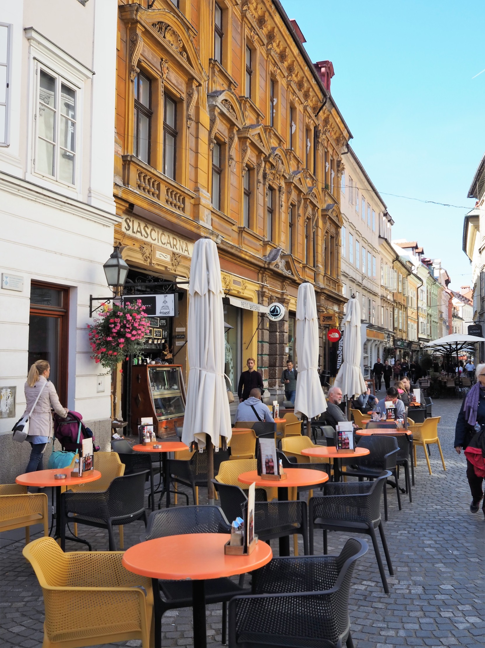 European city with outdor dining tables and Baroque architecture ljubljana slovenia